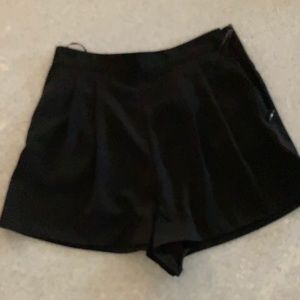 Black pleated dress shorts